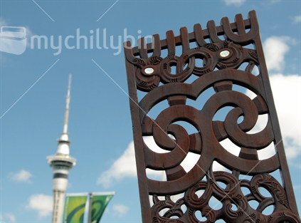 Maori art on Te Wero Island with Skytower in the background, Auckland