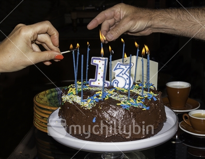 Lighting the candels, 13th birthday cake
