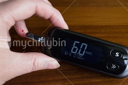 Diabetes - finger test with Blood Glucose Meter
