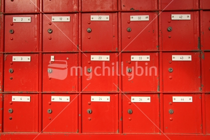 Superstition; rows of private mailboxes, 13 missing. 
