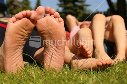 Family relaxing in the sun
