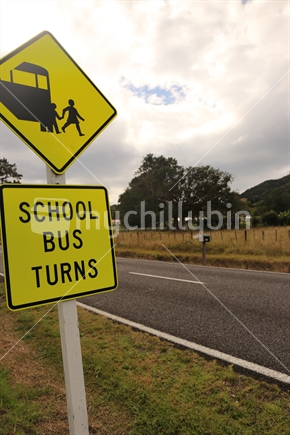 school bus turns sign
