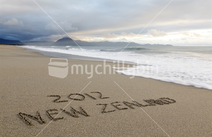New Zealand 2012 written in the sand. 
Advertise and support New Zealand events in 2012.