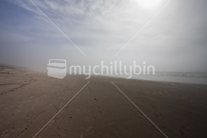 Beach walk through the mist.