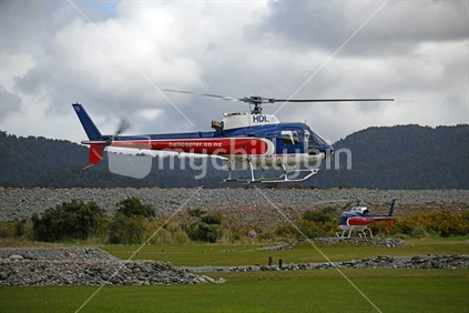 FRANZ JOSEF, NEW ZEALAND, OCTOBER 5, 2019; Tourist helicopters operating at Franz Josef village carry tourists to the world famous glacier in the Southern Alps