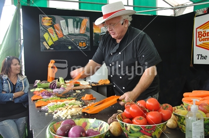 Salesman demonstrating kitchen wares at the Ellerslie International Flower Show 2012, Christchurch