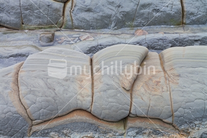 Layered sandstone rock detail at Mataikona (1), Wairarapa