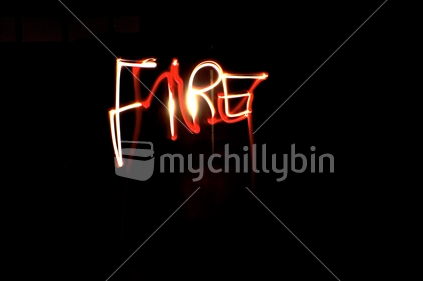 Slow shutterspeed image using a flame to write "Fire"