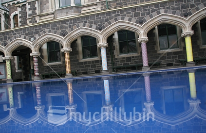 Christchurch Arts Centre and reflection in water, pre 2010 and 2011 earthquake. 