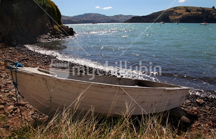 A dingy on the banks waters of Akaroa, New Zealand
