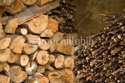 Stacks of firewood of varying sizes