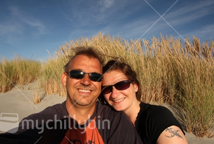 Selfie of the photographer and an unknown MCB photographer taken in the Farewell Spit sand dunes