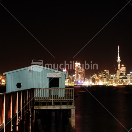 Stanley Bay Wharf at night with the Auckland skyline in the background