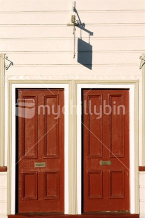 2 doors, one for 'ins' and one for 'outs'?