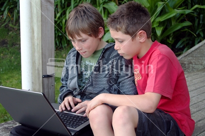 Teenagers with a Laptop