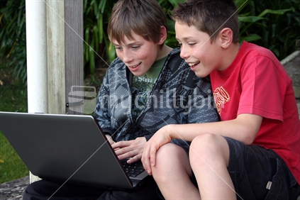 Teenagers with laptop
