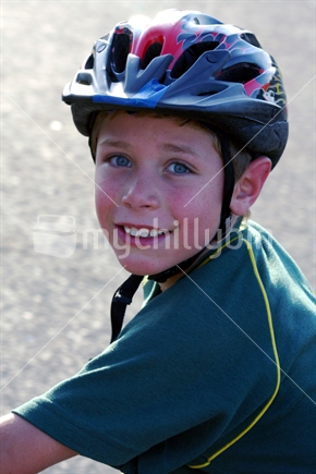 Kiwi kid riding his bike