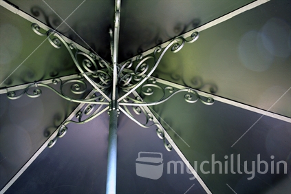 Closeup of an cast iron umbrella