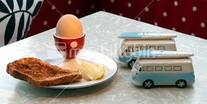 Egg, toast and butter - with retro combi van salt and pepper shakers.