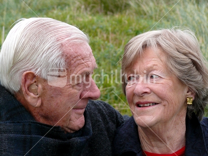 Older couple looking at each other, smiling