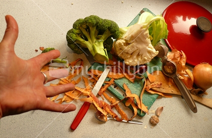 A messy bench with vegetable scraps