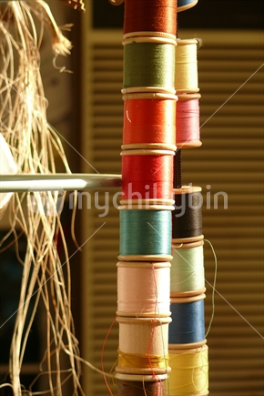 Reels of colourful cotton and raffia
