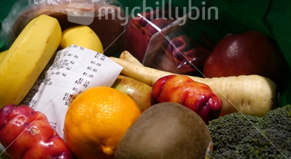 Fruit and vegetables and pre packed products with shopping receipt from supermarket