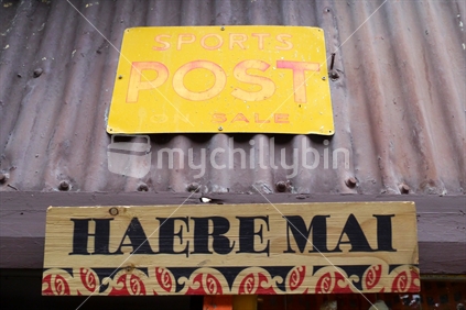 Haere mai and Sports Post signs