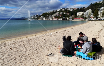 A winter's picnic on the beach at Oriental Bay