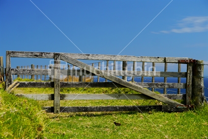 Rustic wooden gate, on seaside farm.