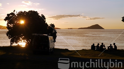 Five men with their campervan in the evening (see also #100093_3066, #100093_3127, #100093_3056) 