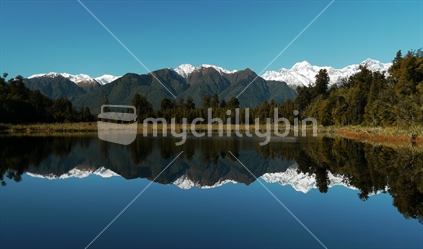 Mirror images on Lake Matheson, The West Coast of the South Island