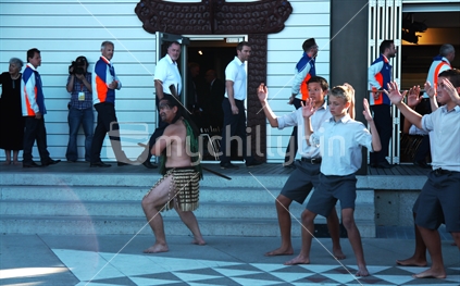 School pupils performing a haka for the English cricket team