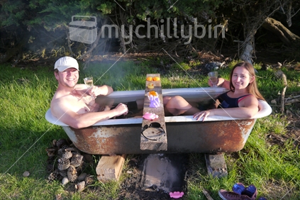 Two people in an outdoor bath