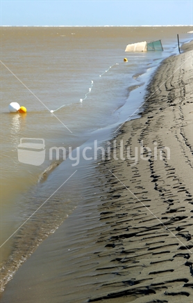 Whitebait nets in river mouth at Foxton Beach