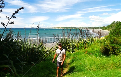 Man walking at Oakura Beach, New Plymouth, Taranaki
