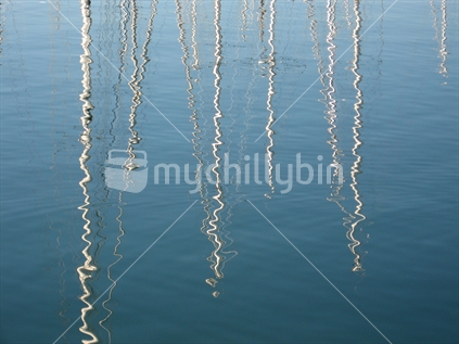 Reflection of yacht masts