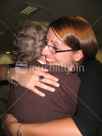 Older woman, Grandmother, embracing grandchild