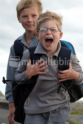 Cheeky brothers on their way to school