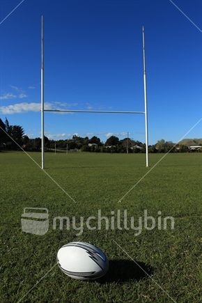 A rugby ball and goalposts.