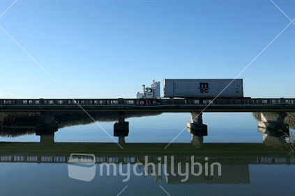 A 40 foot container truck crosses a bridge in Napier.