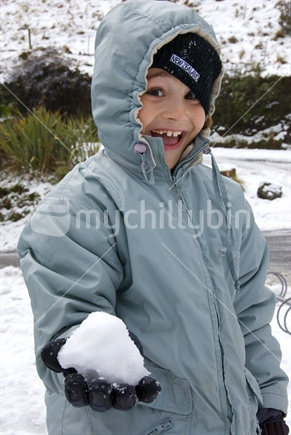Young boy enjoying the snow