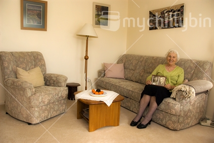 Elderly woman in the comfort of her home