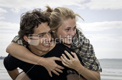 Young happy couple hugging
