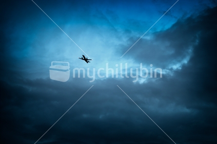 Plane flying through storm clouds