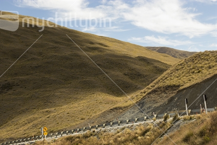 New Zealand scenic road with steep ascent/descent.