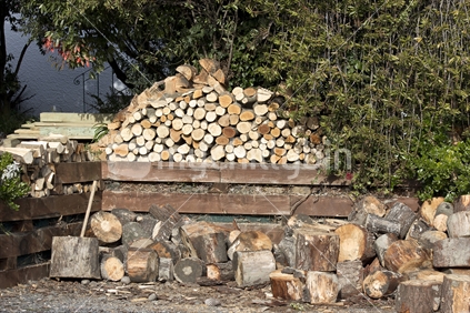 Winter warmth, firewood ready in a New Zealand backyard. 