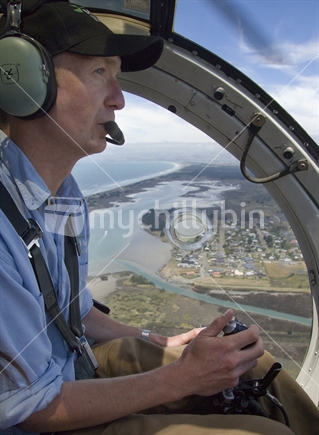 Helicopter pilot while flying