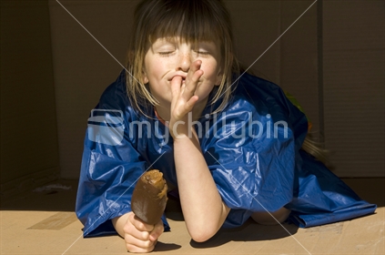 Young girl eating ice cream