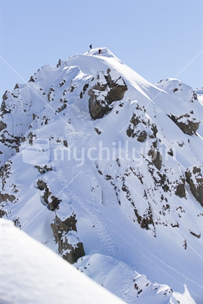 snowboarders hiking temple basin ski area backcountry
